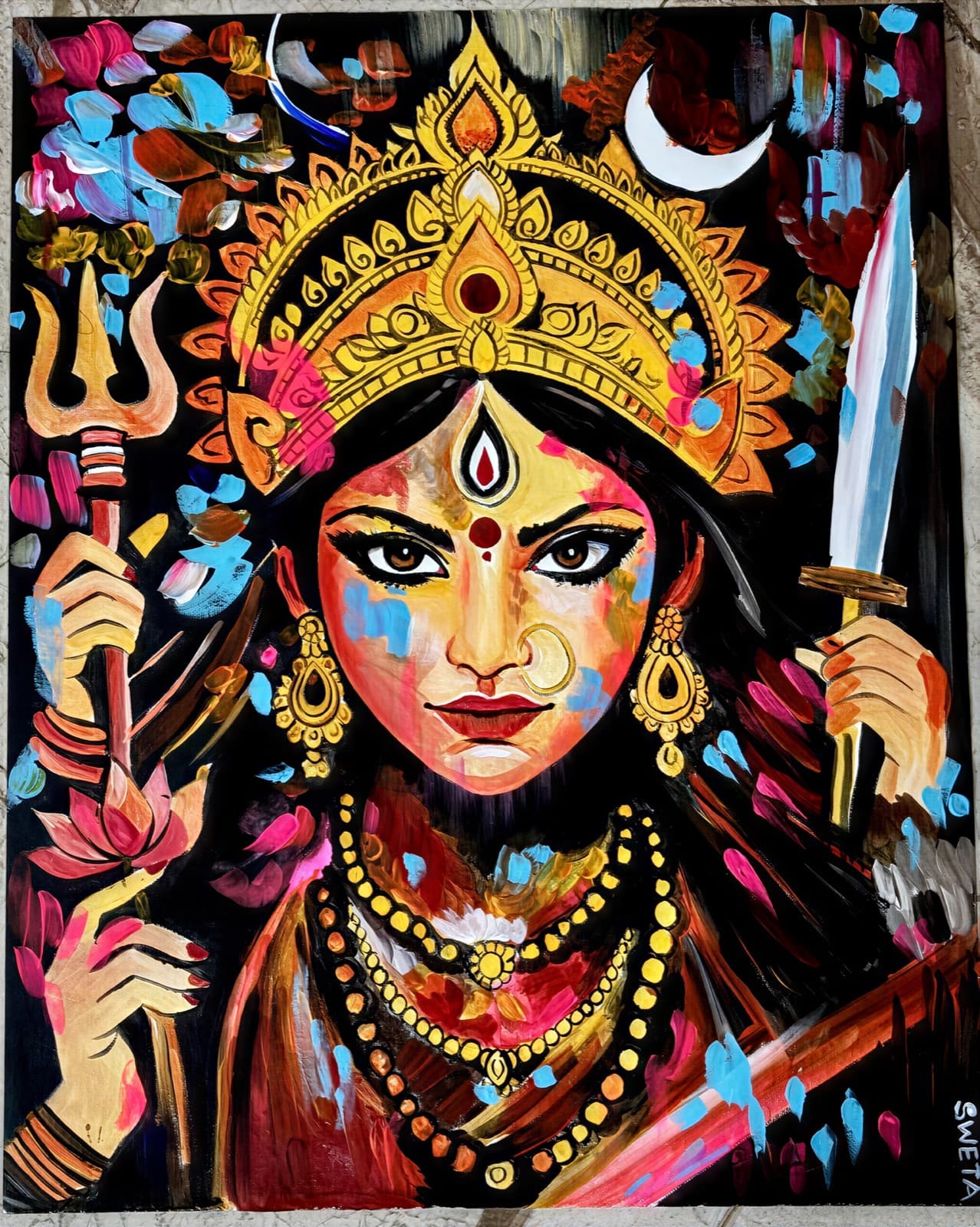 Detail of Durga's golden crown and jewellery